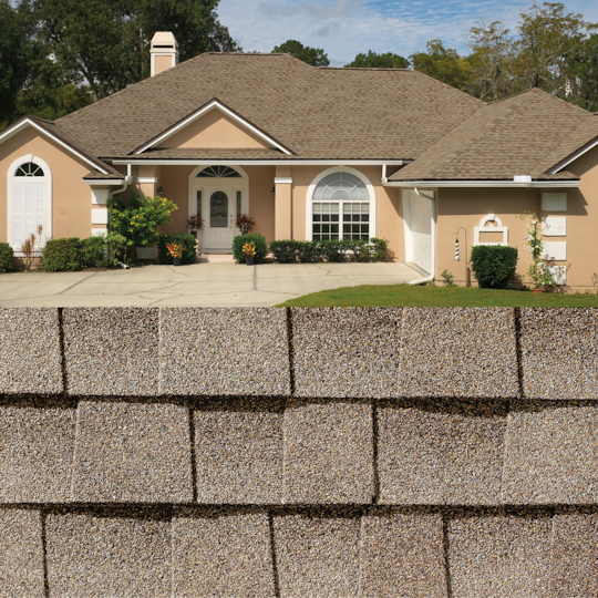 GAF Timberline HDZ® GAF Timberline HDZ Driftwood Shingle closeup with sample product image on a beige house.