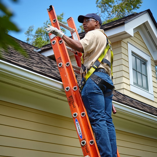 GAF certified roofer on ladder