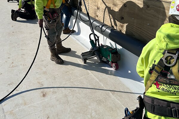 JC Roofing & Insulating contractors working on the roof for the Goodwill of the Great Plains headquarters