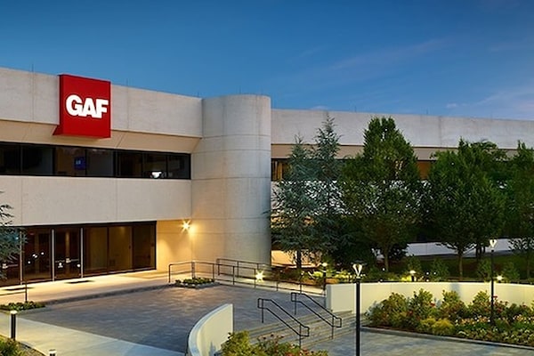GAF headquarters building with a large red GAF logo at the front entrance.