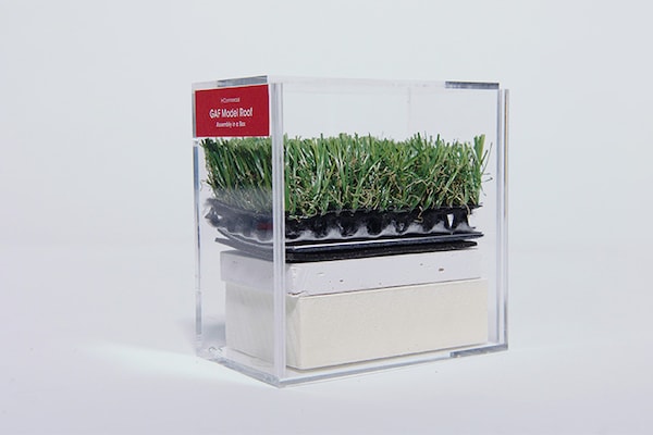 Hands-on roof assembly model made from real and simulated layers in an acrylic box. 