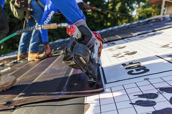 A roofing contractor installs the solar product system that includes Timberline Solar® ES 2, the first nailable solar shingle. 