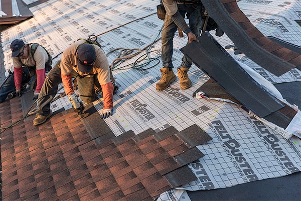 GAF certified roofers installing GAF products on a roof.