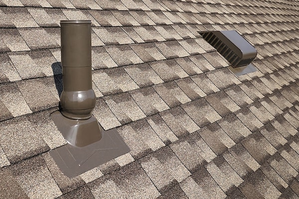 Rooftop accessories manufactured by GAF on a roof, helping prodct against leaks. 