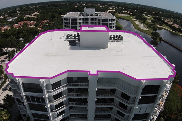 Aerial photo of a commercial roof that has been  measured as part of a GAF Quickmeasure report for design pros