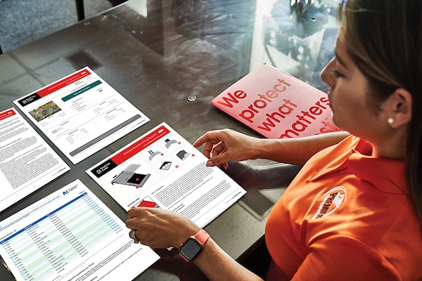 Woman working with GAF Business Services reports 