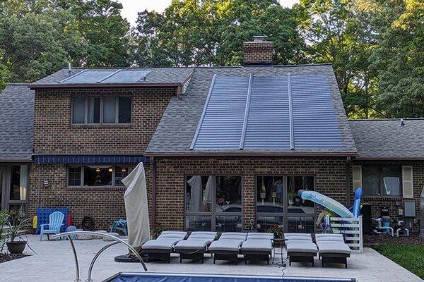 A homeowners photo of a new GAF Energy Timberline Solar® Roof system on their home