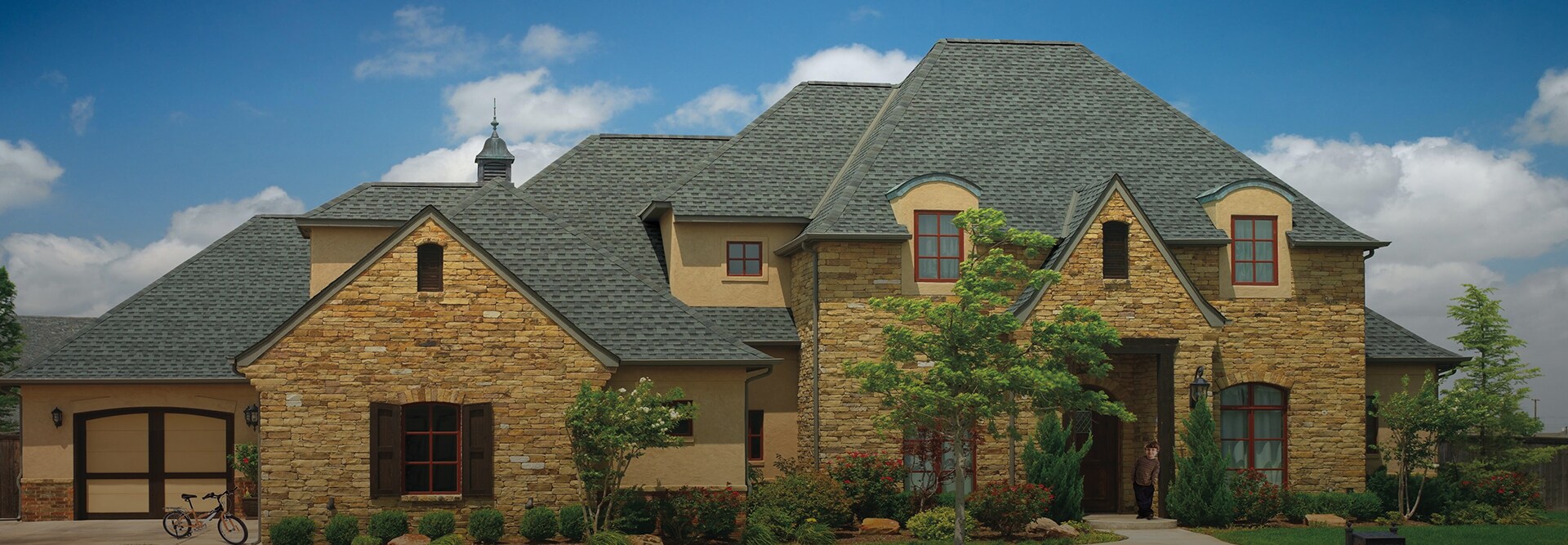 Residential home with Slate shingles made by GAF