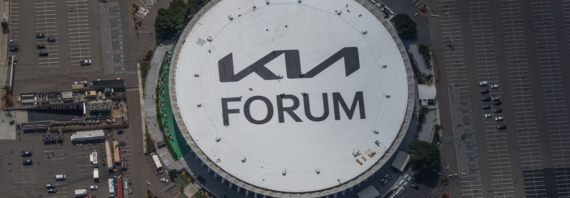 Aerial view of the Kia Forum GAF coated roof with new logo