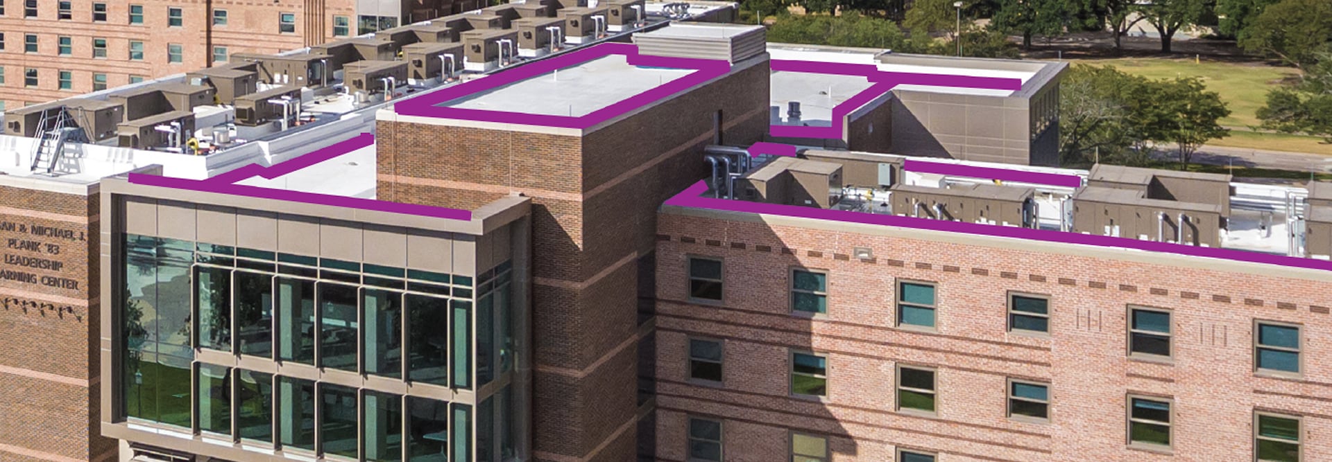 Commercial buildings with roof measurement outlines provided by QuickMeasure