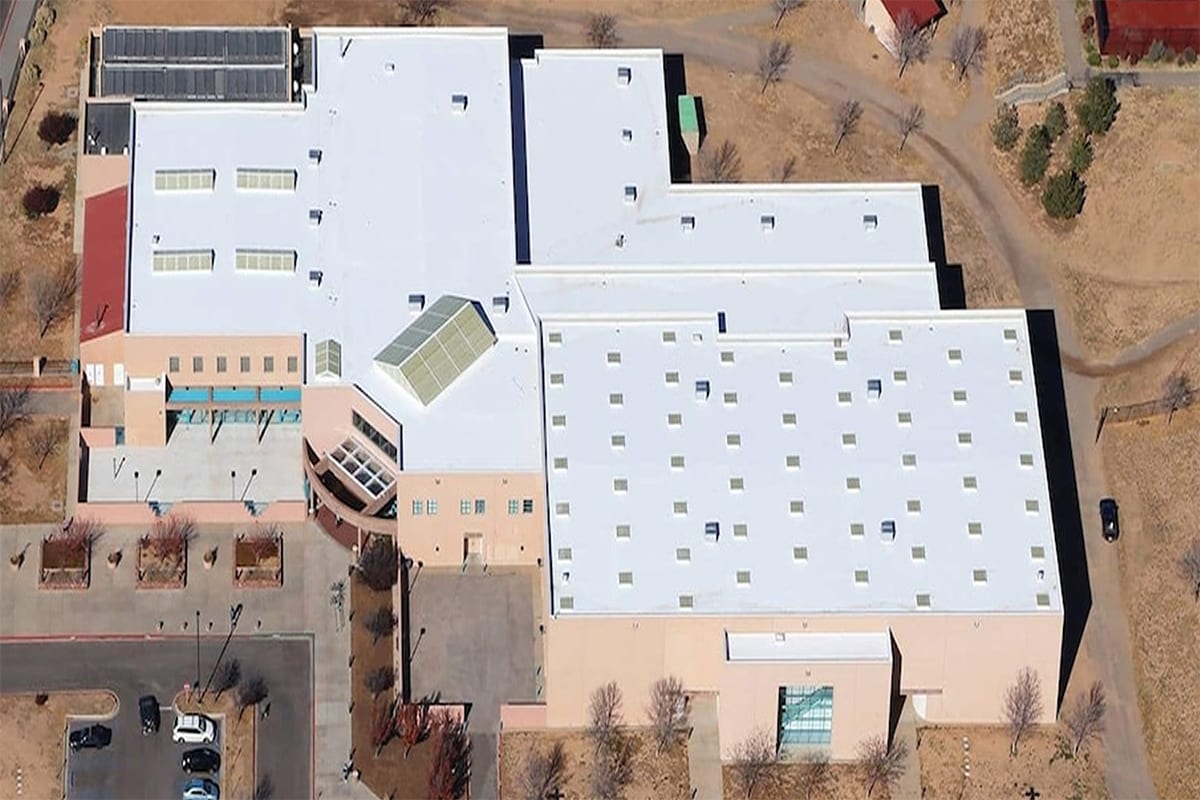 aerial view of an educational facility that has a hybrid system installed