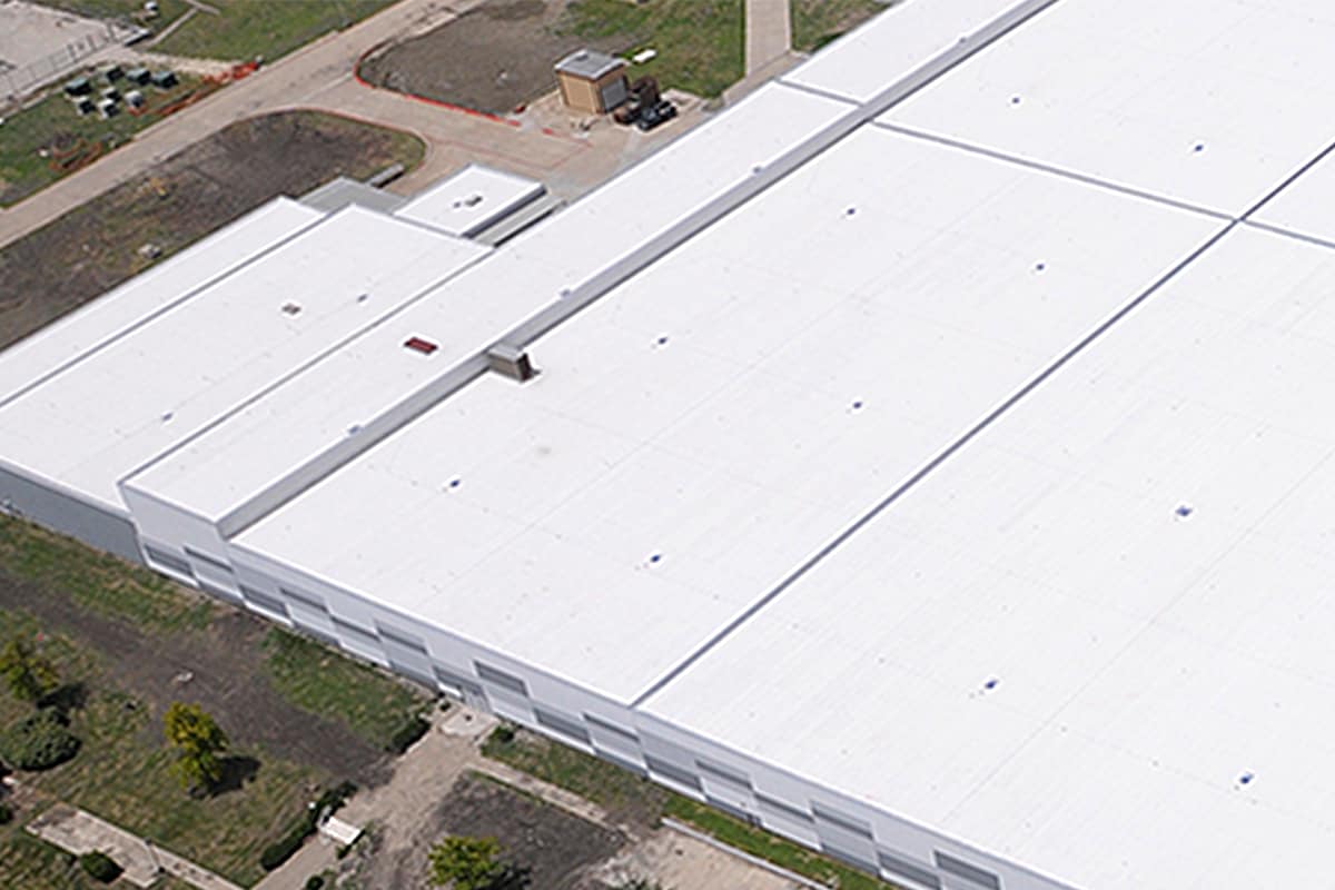 aerial view of a convention center with a hybrid roofing system  installed