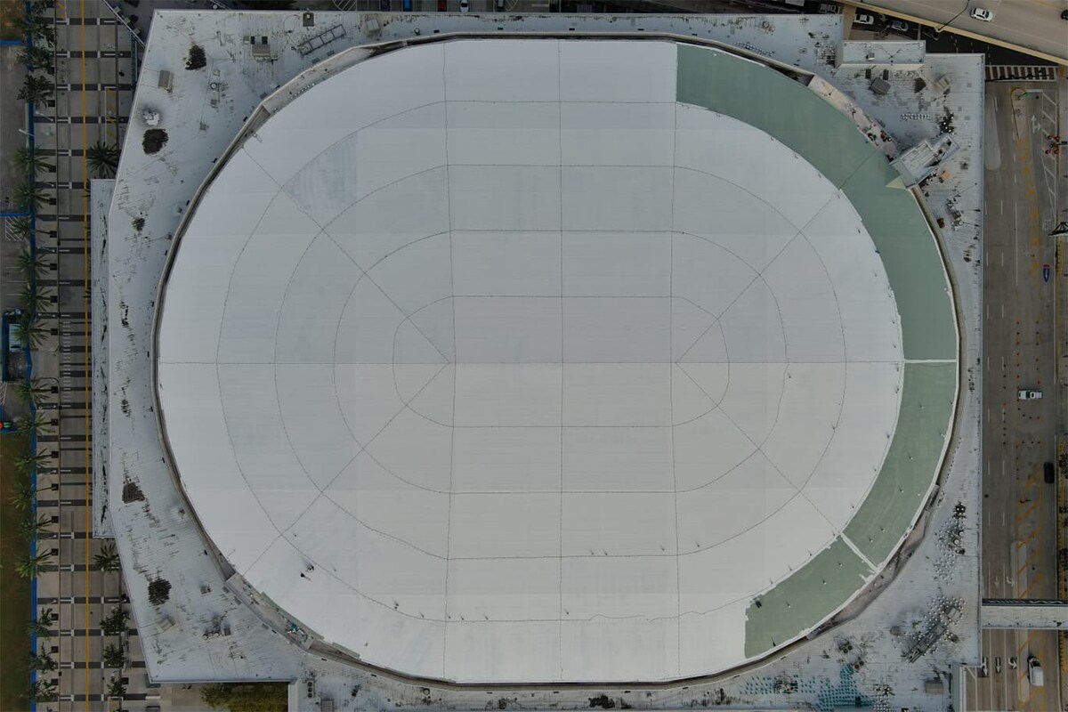 RMS Orlando roofing contractors installing new GAF roofing materials at the Kia Center.