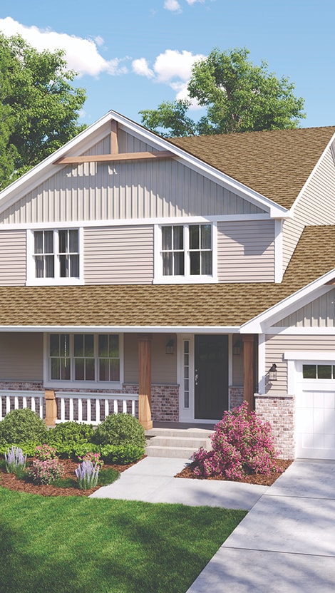 Bird’s eye view of a house with Shakewood roofing shingles manufactured by GAF.