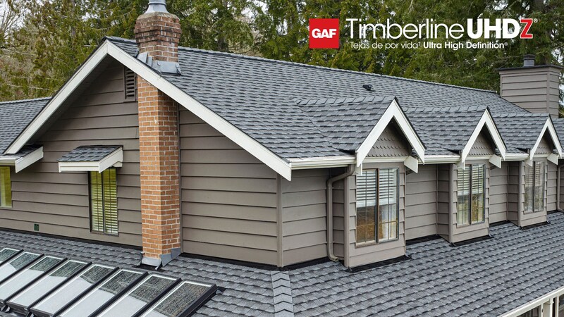 Beauty shot of gray home with UHDZ Pewter Gray shingles.