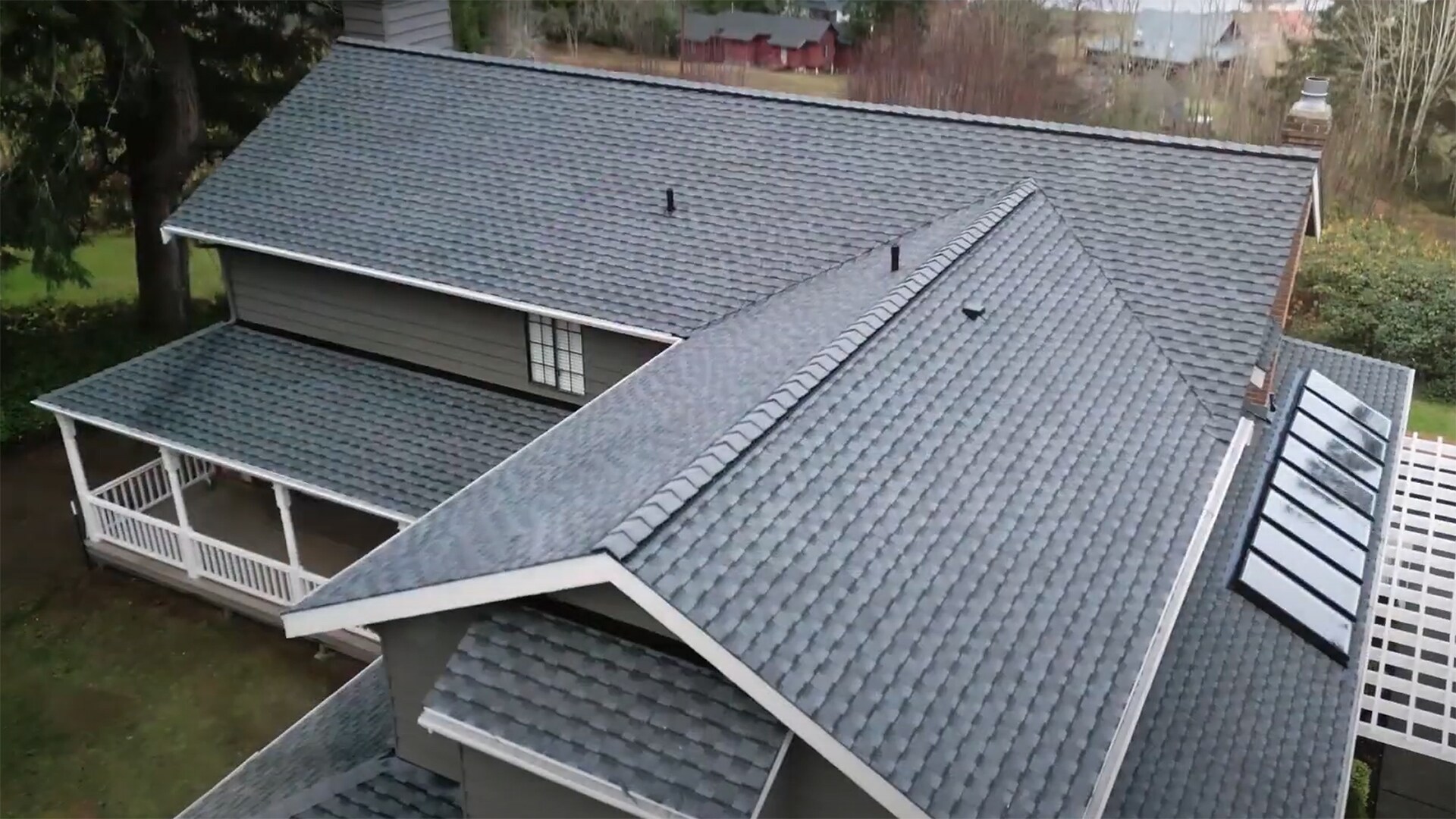 Timberline UHDZ shingles on a gray house